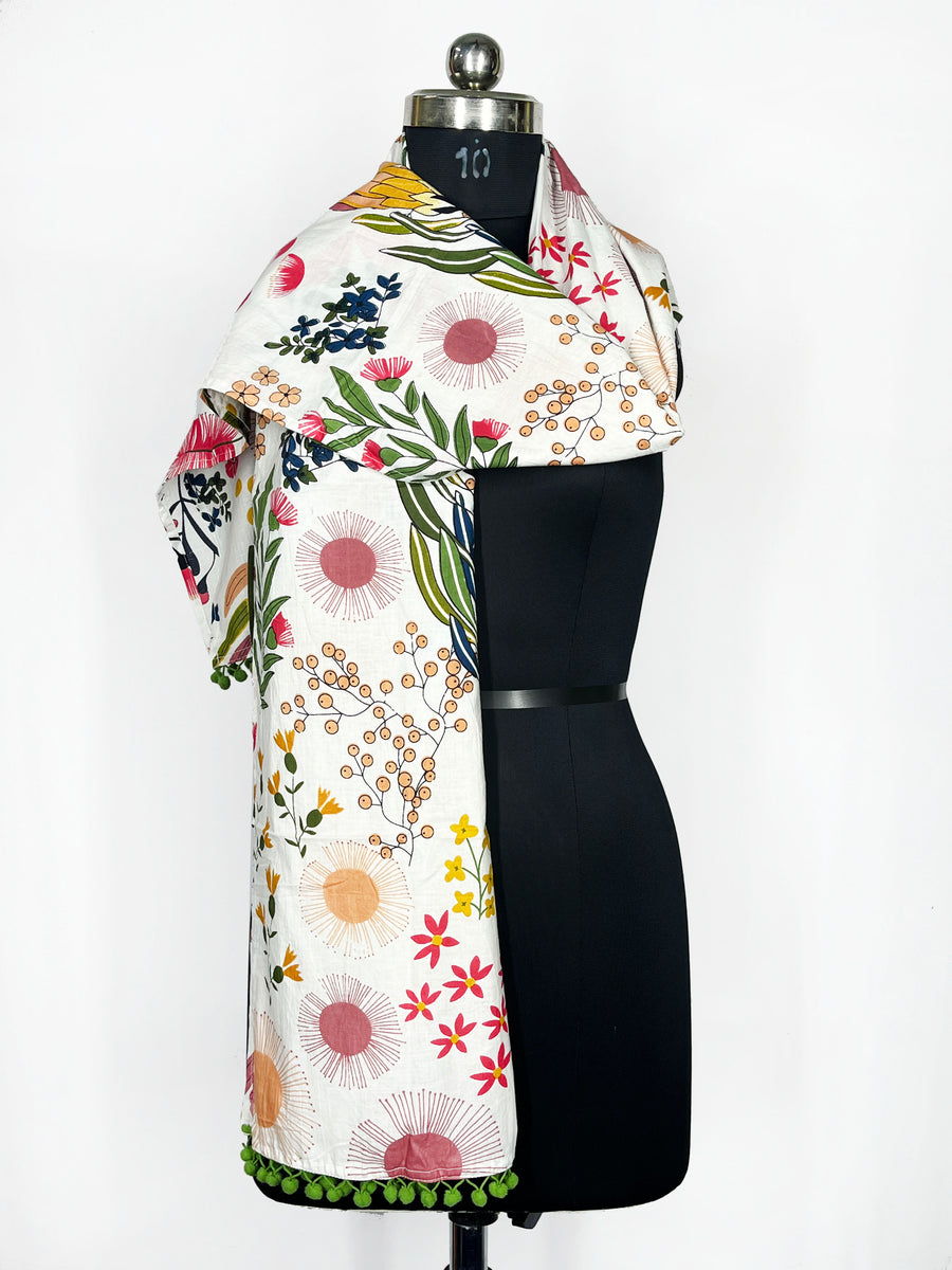 White Botanical Print Scarf with Green Pom-Pom Trim – Vibrant Floral Accessory