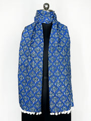 Pom-pom trim and an intricate paisley print adorn this royal blue scarf 22x72 Inch